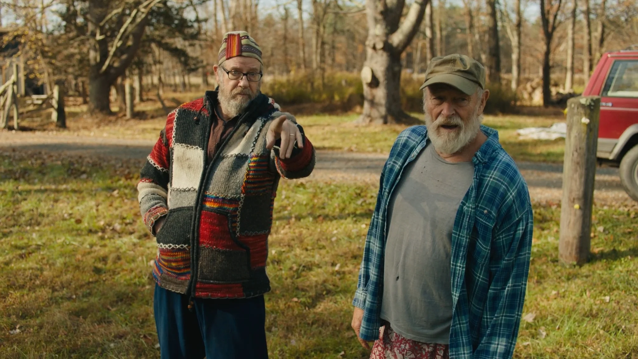 Lenny and his longtime friend stand together outside in a WOODSTOCKERS scene.